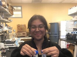 Karissa held samples of liquid infant formula.